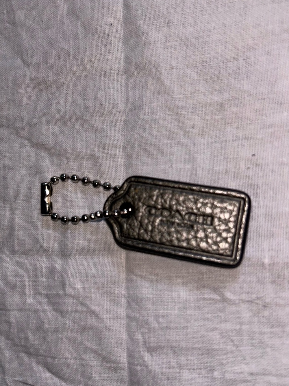 Coach Pebbled Leather Key Tag in Metallic Silver